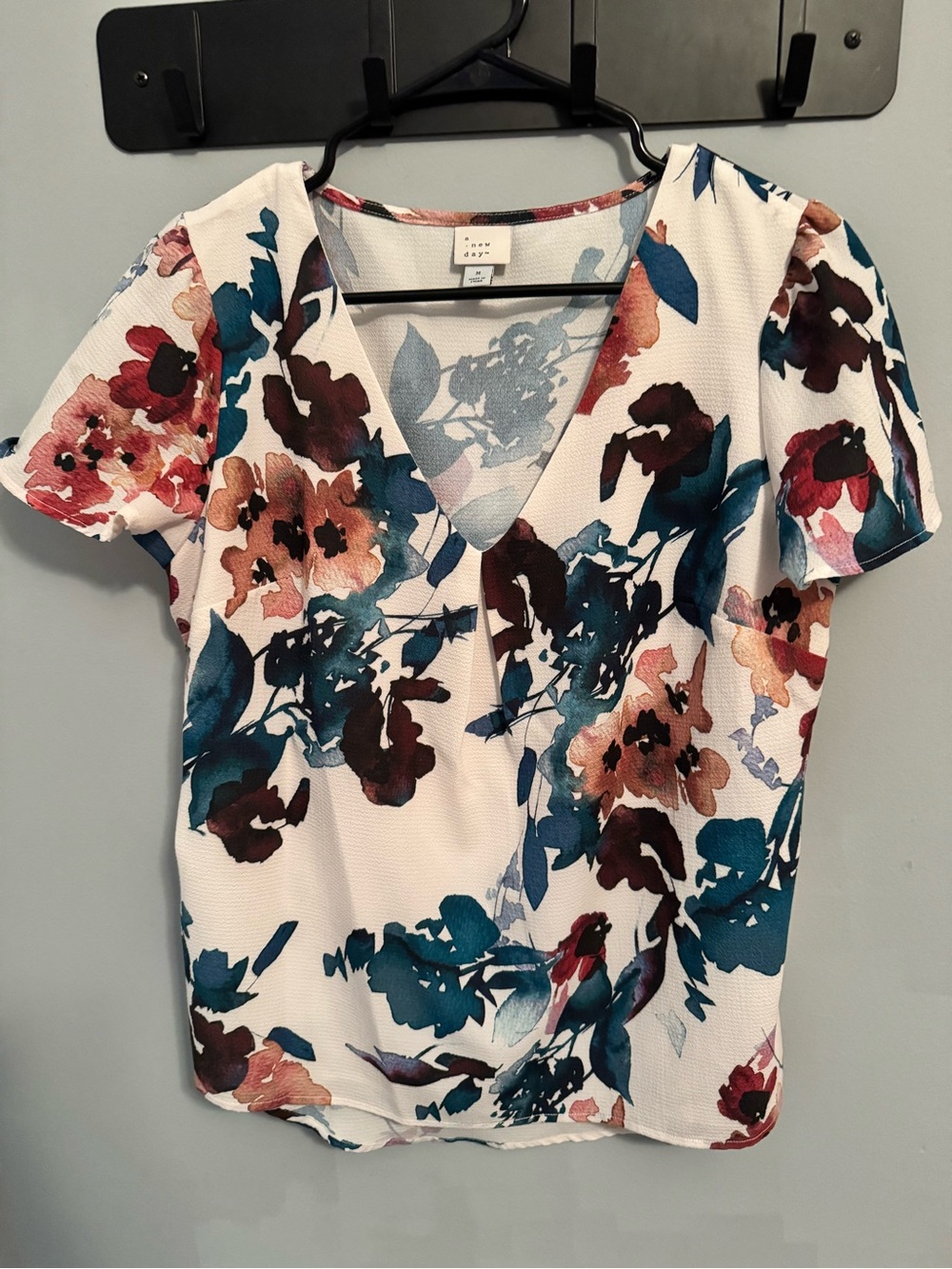 a new day White Floral V-Neck Blouse with Teal & Rust Accents